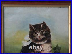 Antique oil painting of a cat with a blue bow 1917 folk art country home rustic