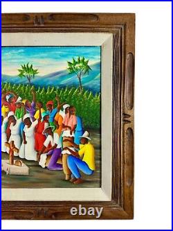Haitian Folk Art Painting by Michel Rouanez (b. 1956) An untitled village scene