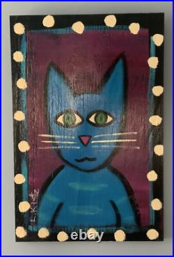 L. Kluttz Folk art painting on Wood board of Blue Cat, 12 X 18