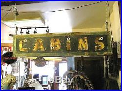 Vintage Tin Ex Neon Cabins Sign Folk Art Old Paint Shipping Available